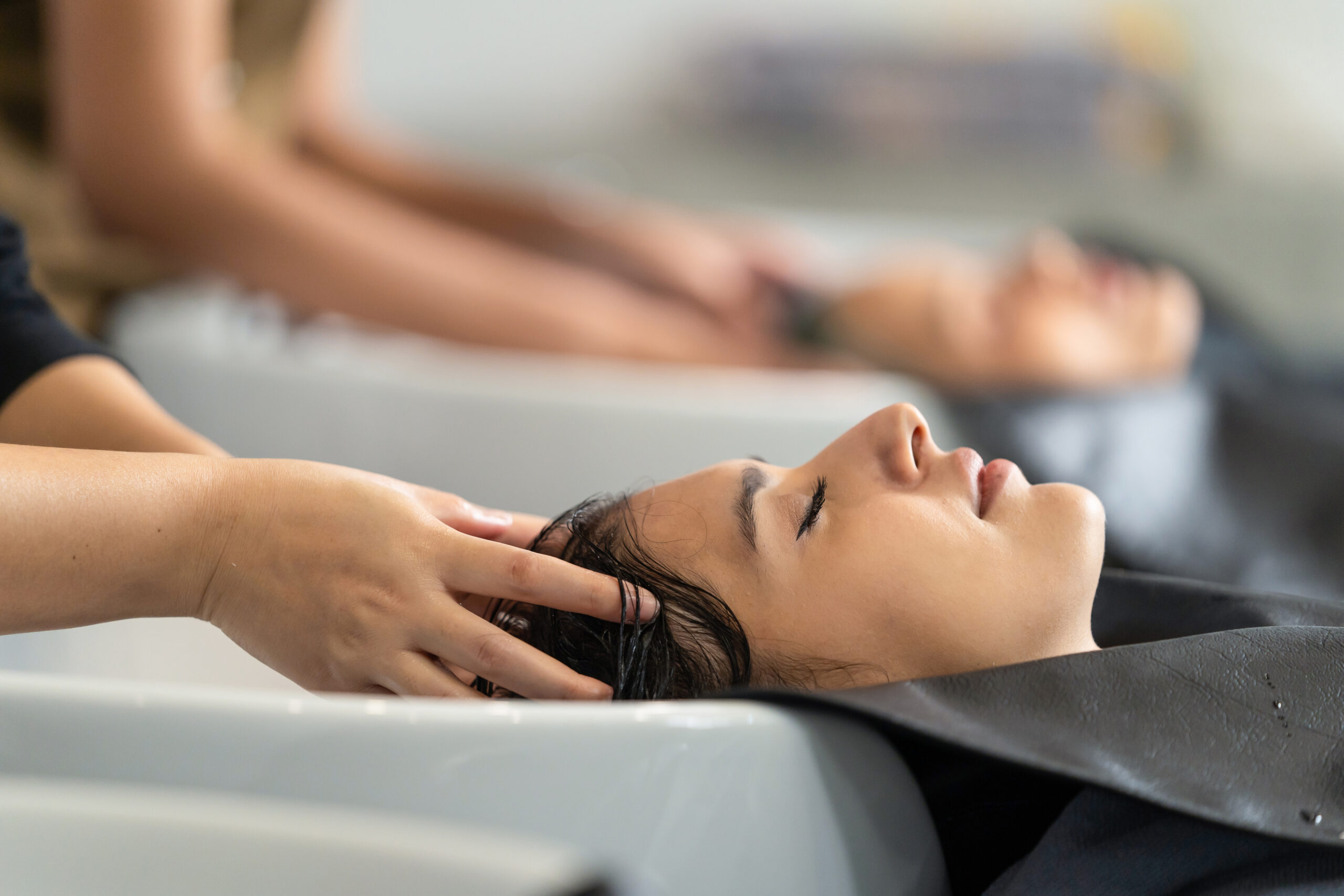 Professional hair washing and scalp massage